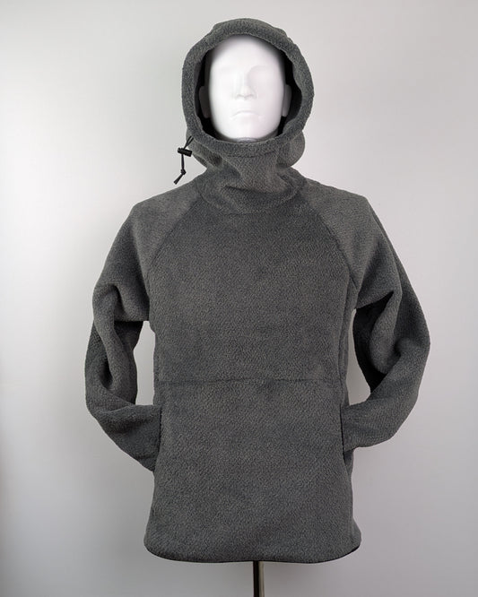 Gray hooded sweater on a mannequin against a plain background
